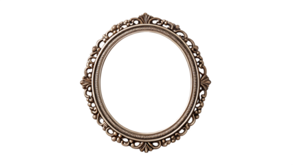 A hand mirror with ornate frame and a slight reflection