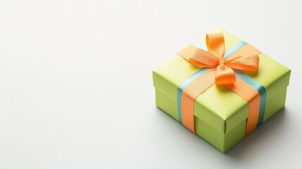 Obraz premium Light green gift box with orange and light blue ribbons indoors