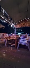 A bar in a wooden hut by the sea
