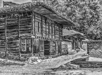 Beautiful vintage wooden house exterior in black and white