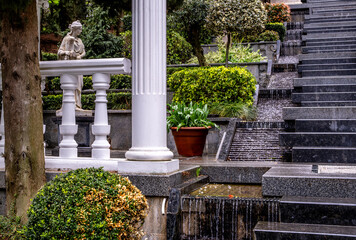 Marble sculptures in the park on a summer day.