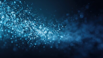 Obraz premium Vibrant blue particles flow gracefully against a dark backdrop, resembling a mesmerizing cosmic scene. The dynamic movement captures the beauty of light in motion.