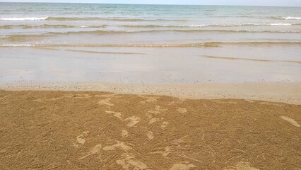 sand beach with waves