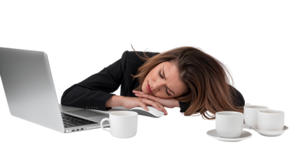 Exhausted professional woman resting on desk after long hours with coffee and laptop