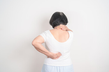 Elderly woman having back body ache for concepts of Back Muscle Strain, Piriformis Syndrome, Low...
