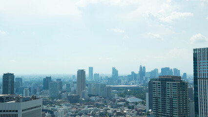 Modern cityscape with skyscrapers and blue sky