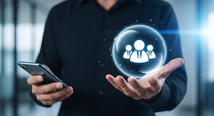 Person holding a glowing sphere with a team icon, conceptualizing teamwork, collaboration, and digital connection.