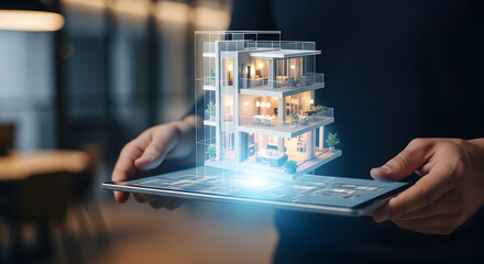 Person holding a digital tablet with a futuristic holographic building design, representing architectural concept and innovation.