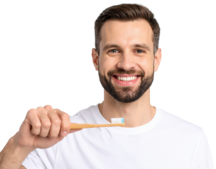 A smiling man holds a toothbrush, promoting dental hygiene with a bright expression against a black background.