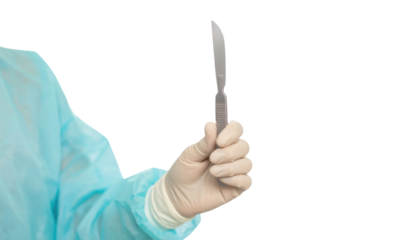 A gloved hand holds a surgical scalpel, showcasing its sharp blade and precision design, emphasizing its role in medical procedures.