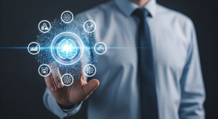 Person in a business suit interacting with a holographic projection of interconnected icons representing data, networking, and digital concepts.