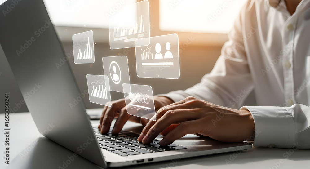 Poster close-up of a person's hands typing on a laptop keyboard, with overlaid digital graphics representin