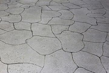 Concrete floor with decorative stamped pattern.