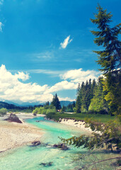 The Isar River winds its way through the valley in the Alps