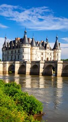 Obraz premium A grand chateau over a river