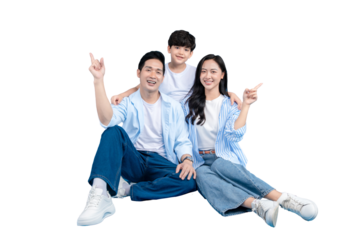 Asian family of three sitting together, pointing upwards, smiling on png background