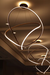 Modern abstract ceiling light fixture with glowing geometric design