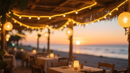 Cozy beachside restaurant setup with string lights and ocean view at sunset