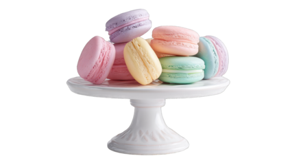 Pastel macarons on a white cake stand