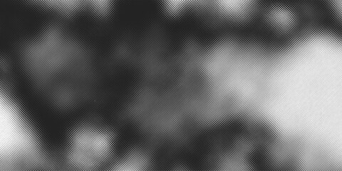 Soft blurred grayscale abstract background with cloudy gradients and smooth light and dark tones. Dreamy, foggy, and minimal atmosphere with diffused textures.