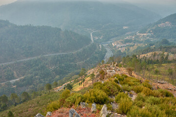 Mirador da Picota in the Peares offers a dramatic view of the Galician valley hidden by smoke from...