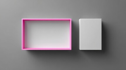 Open pink box next to white box on gray background