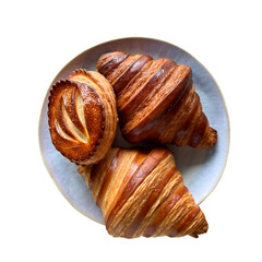 Fresh puff pastry pastries on a ceramic plate. Isolated on a white background. 