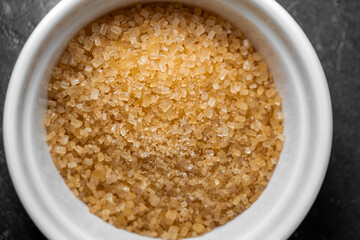 Close-up of brown cane sugar in a bowl
