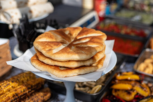 Placinta is national Moldovan flour-based dishes, including a variety of fried pies with fillings such as cottage cheese, potatoes, cabbage, and more.