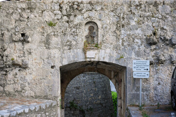 Historic stone arch entrance in the medieval wall of Saint Paul de Vence Provence France