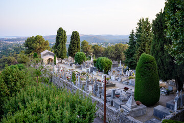 Historic cemetery with graves and cypress trees in Saint Paul de Vence Provence France