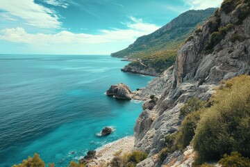 Fototapeta premium Sunny coastline with blue ocean and cliffs 