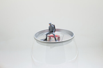 Miniature Figure on Glass Jar Representing Creative Imprisonment and Escape