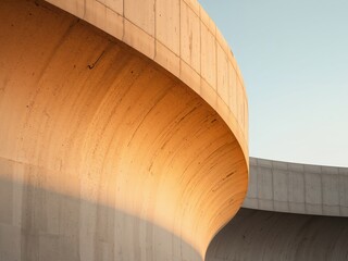 Obraz premium Curvilinear Concrete Architecture A Study in Light, Shadow, and Modern Design.