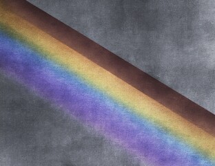 Diagonal rainbow stripe on textured gray background
