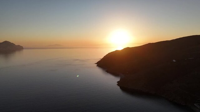 Sunset in Greece | 4K drone shot | Aerial drone shot near Aigiali bay and the island of Nikouria in the background
