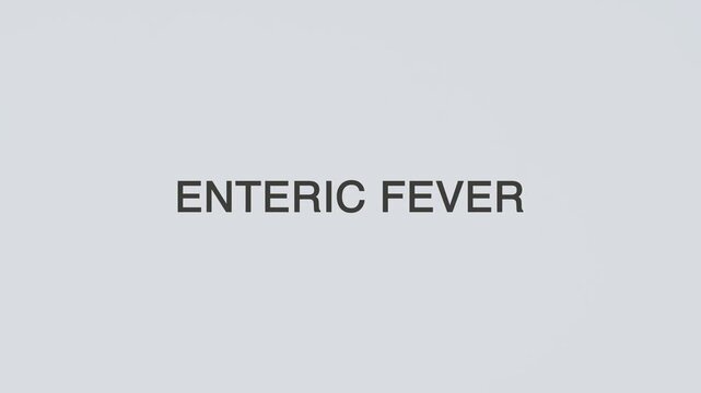 Enteric fever word diagnosed with a stethoscope held in hand on a white background, illustrating typhoid infection, medical evaluation, healthcare concept, and patient awareness