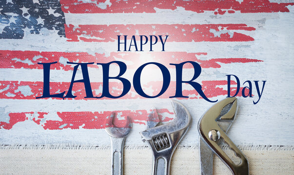 Happy Labor day banner and USA flag with steel pliers on wood texture background, laborday poster background idea