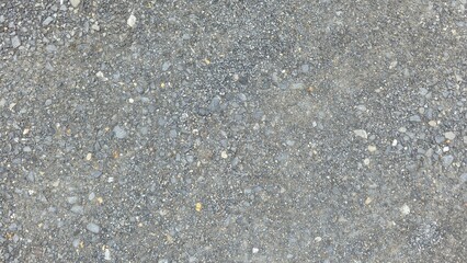 Gray gravel floor in the yard, parking lot with gravel on the ground, outdoor floor with small stones, gravel road, gravel texture image.