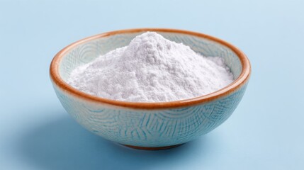 High definition photo of white zinc oxide powder in small bowl. Healthcare and medical supplement product. Chemistry.