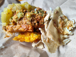 Nasi pecel or sego pecel is a typical Javanese Indonesian rice dish served with pecel sauce, which...