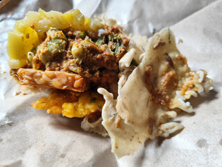 Nasi pecel or sego pecel is a typical Javanese Indonesian rice dish served with pecel sauce, which...