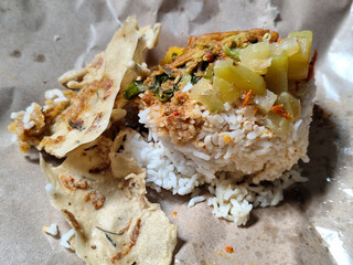 Nasi pecel or sego pecel is a typical Javanese Indonesian rice dish served with pecel sauce, which...