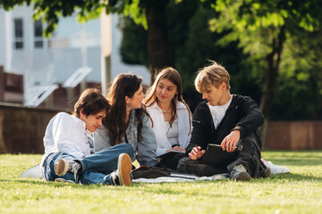 Fototapeta premium Exam preparation, sitting and learning. Group of students are near university together