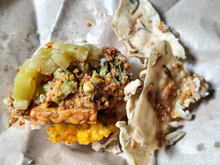 Nasi pecel or sego pecel is a typical Javanese Indonesian rice dish served with pecel sauce, which...