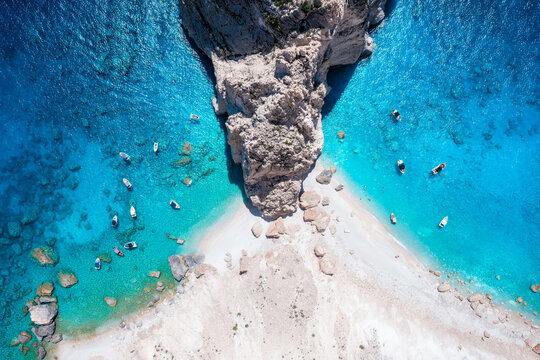 Fototapeta Aerial overhead view of the famous Mizithres rocks and beach at Keri, Zakynthos, Greece, with shining, turquoise sea and white cliffs