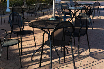 metal table and chairs at the outdoor cafe