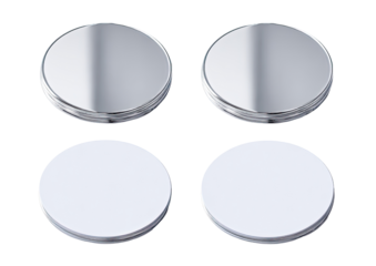 Four circular, reflective, and blank cosmetic or dental discs. Two sets of polished, round pieces, one set reflective, the other blank