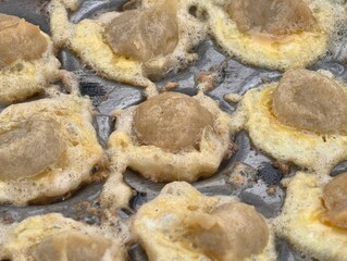 Close-up of Delicious Fried Meatballs in Batter.