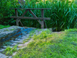 Wooden fence by the pond